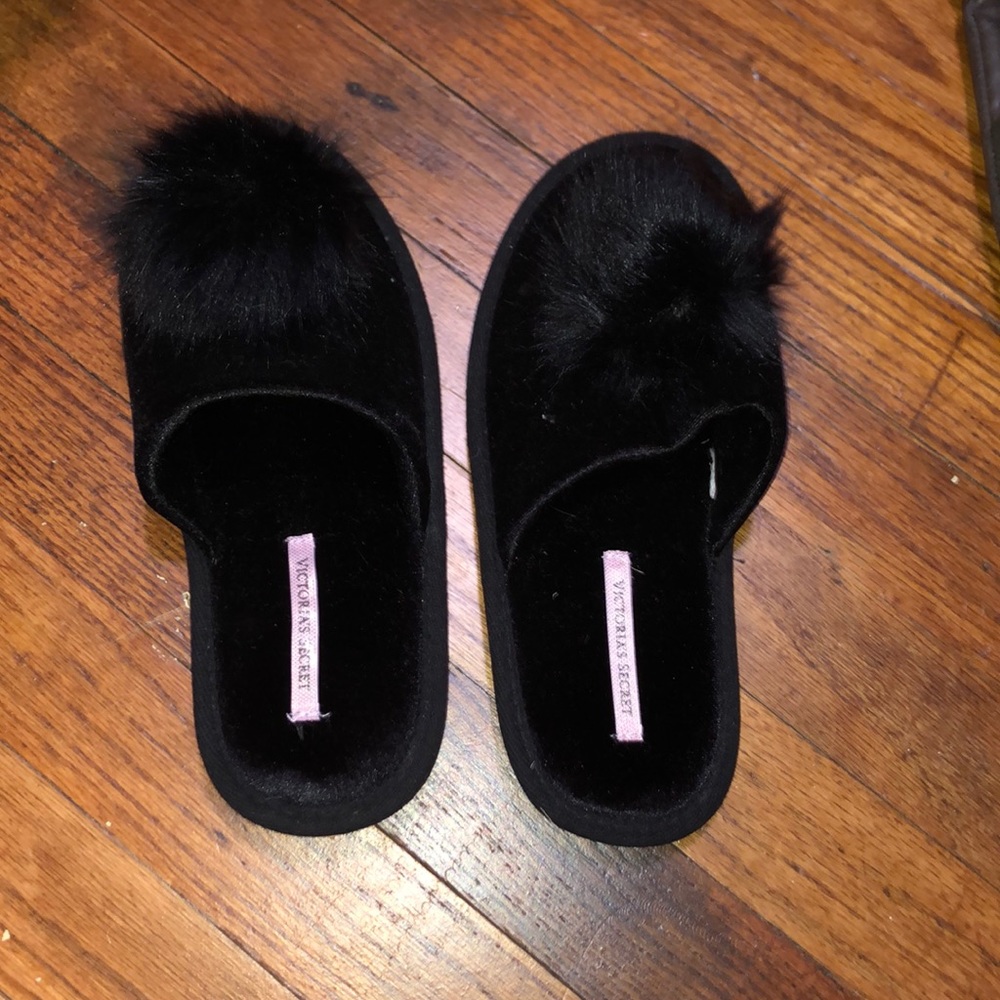 Victoria’s Secret black slippers.